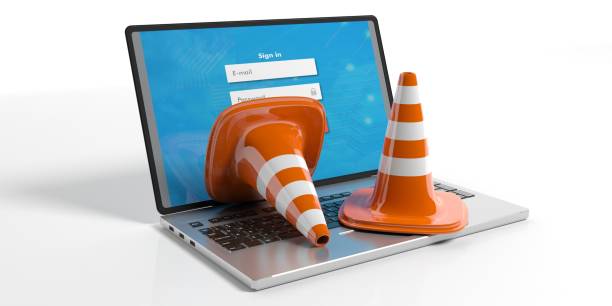 istock Traffic cones on a laptop, 3d illustration 1024045094