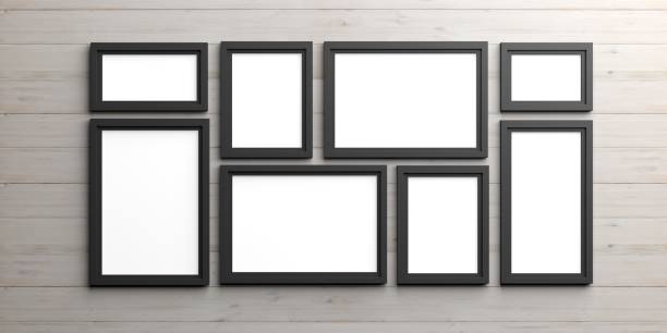 istock Black frames on wooden background. 3d illustration 1024045308