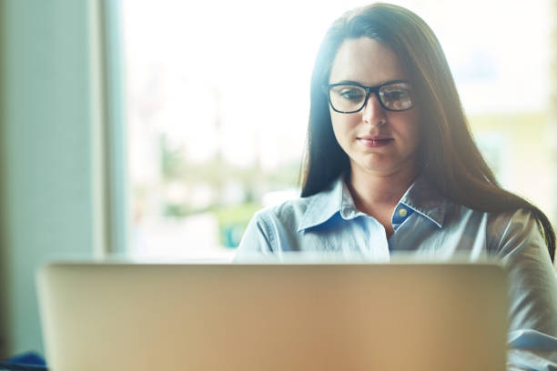 istock You can tell she's caught deep in the browsing zone 1024055354
