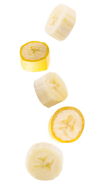 istock Falling slised banana fruits isolated on white 1024055962