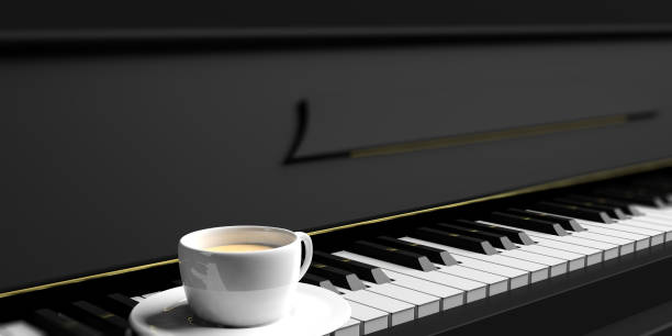 tazza di caffè su una tastiera per pianoforte. illustrazione 3d - espresso music theatrical performance coffee foto e immagini stock