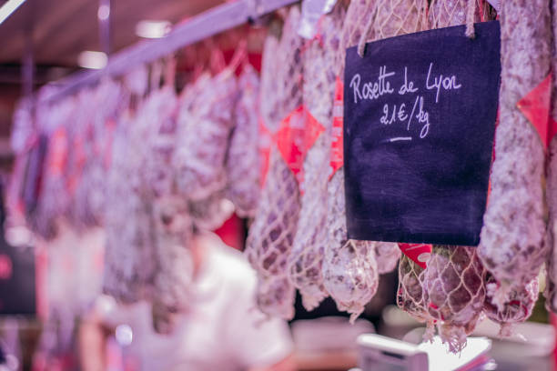 Market wit typical french products. Hanged rosette de Lyon (cured saucisson from Lyon)