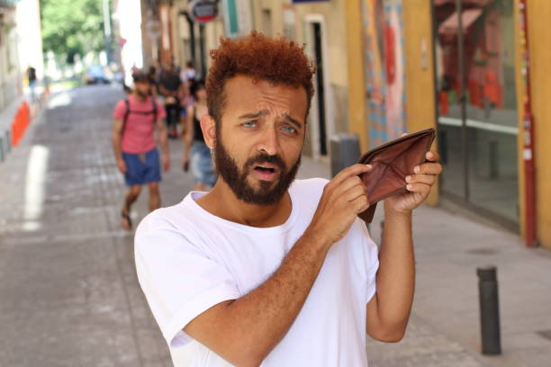 istock Student having economic difficulties outdoors 1024081438