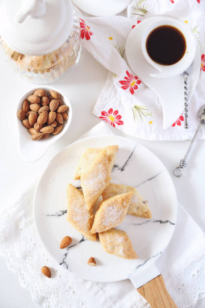 istock Italian cookie: almonds Canistrelli and cup of coffee 1024083448