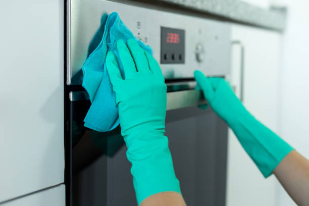 istock Hand in rubber glove cleaning 1024097074