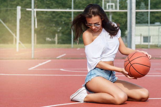 istock Woman on basketball playground 1024110030