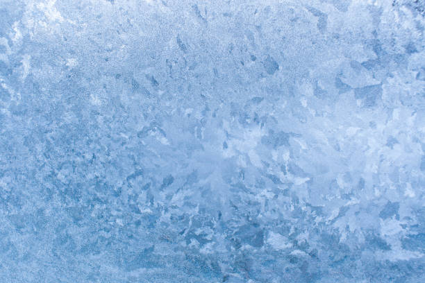 istock Natural ice pattern on frosty glass. 1024115300