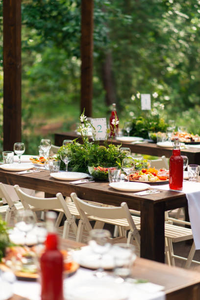 istock Elegant wedding table arrangement, floral decoration, restaurant. Wedding table setup. Wedding in the forest 1024116586