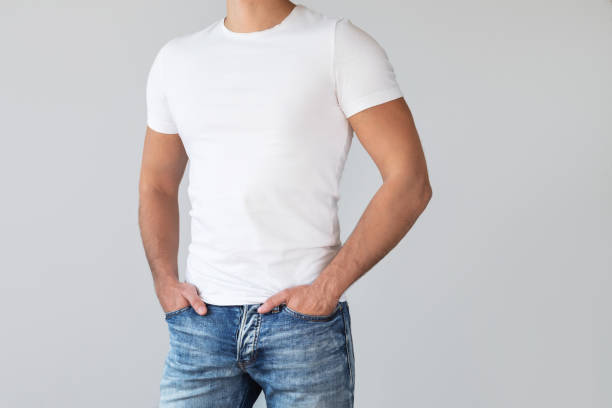 istock Man wearing a white cotton shirt with empty space for your text or logo 1024123272