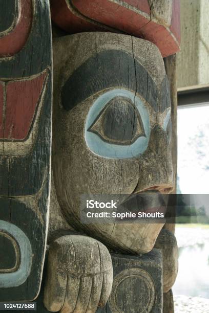 Close Up Of A Face On A Totem Pole In Vancouver Canada Stock Photo - Download Image Now