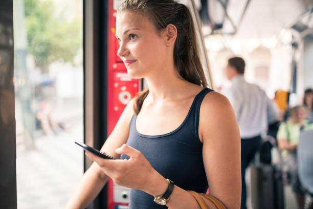 istock Beautiful woman traveling by a train 1024129660
