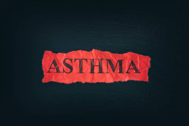 istock Torn piece of paper with the word Asthma 1024129958