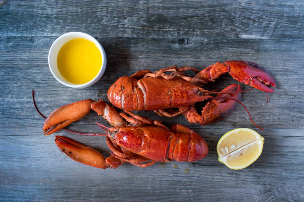 istock red lobsters with lemons and butter 1024131048