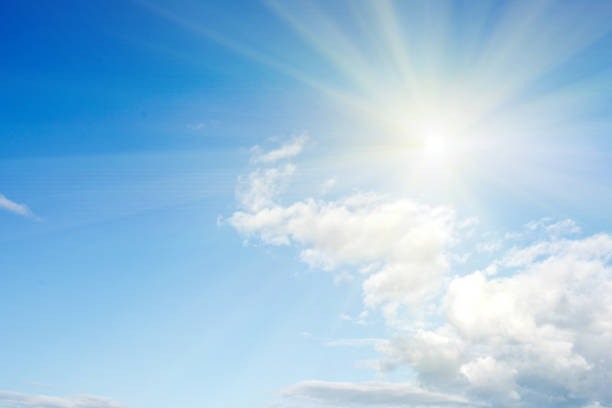 istock clouds against a blue sky with rays of the sun 1024138712
