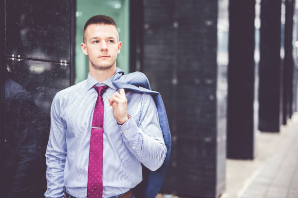istock Businessman walking on a sidewalk 1024138982