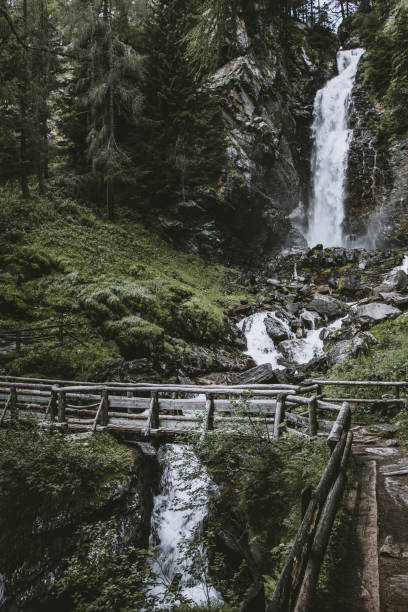 saent waterfall in trentino italian alps