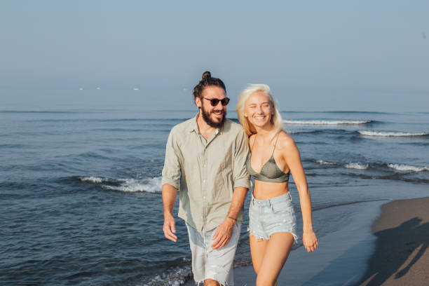 istock Couple hugging at the beach 1024145806
