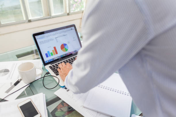 istock Open laptop and accessories with coffee cup for workplace 1024156486
