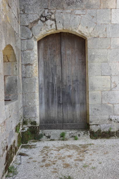 istock Side door in Sablonceaux Abbey 1024163368