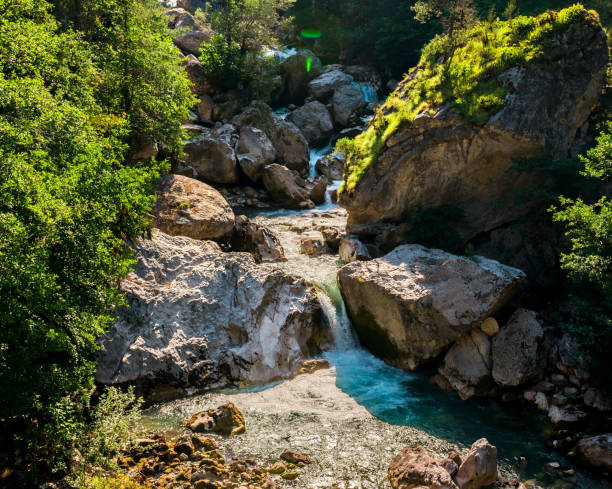 istock pure waterfall in the mountains 1024163804