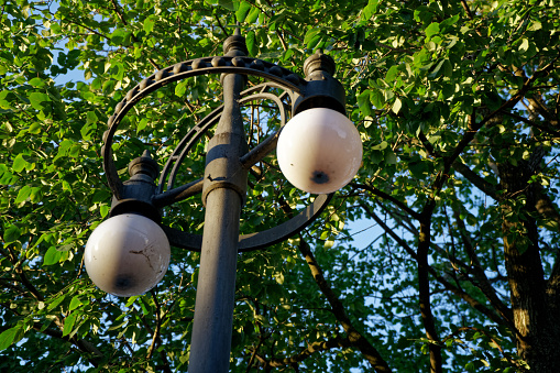 Close up old street lamp in Bucharest, Romania