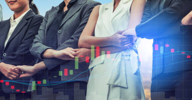 istock Double exposure business people holding hands. 1024173460