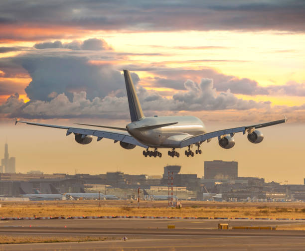 istock Airplane Airbus 380 before landing on runway 1024179806