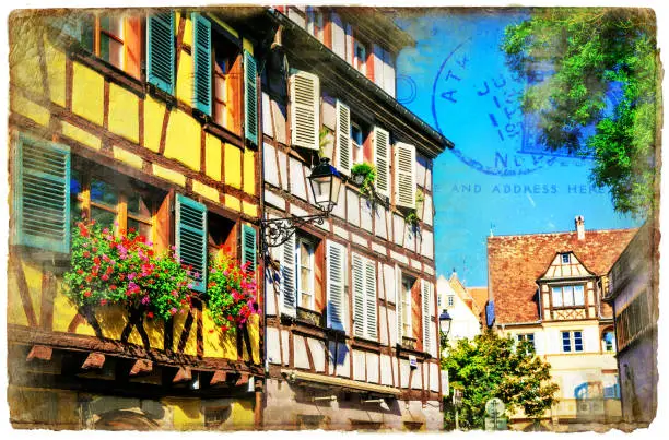Photo of Colorful floral town Colmar in Alsace, France. Retro styled picture