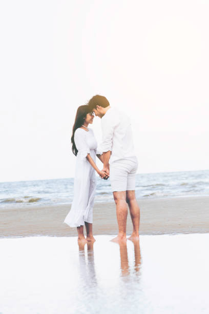 istock Couple going honeymoon on tropical beach in summer 1024187988