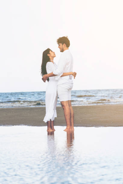 istock Couple going honeymoon on tropical beach in summer 1024188072