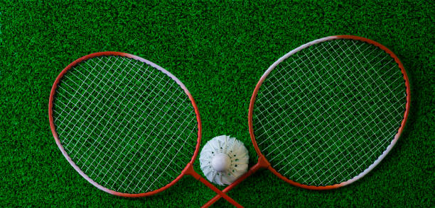 istock Badminton Rackets And Shuttlecock on grass 1024193802