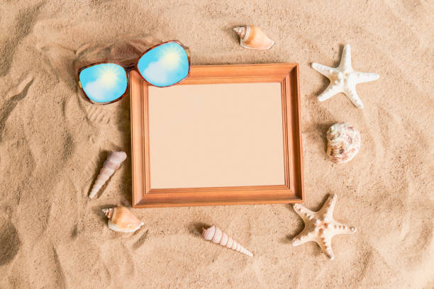istock Wooden frame, sunglasses and seashells 1024197052