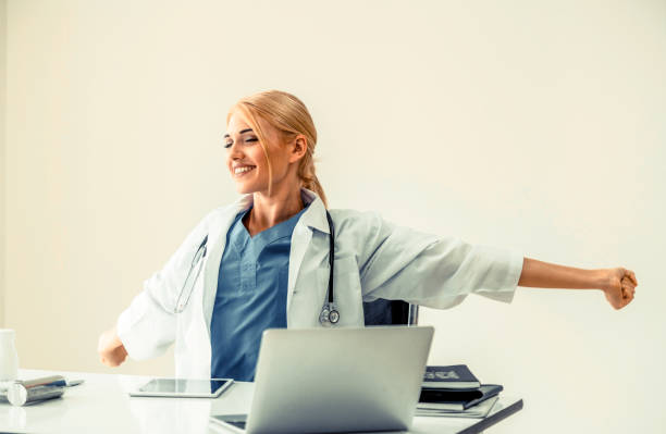 Relaxed doctor taking a break in hospital office.