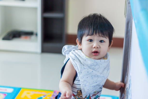 istock Baby happy playing in the house 1024197796