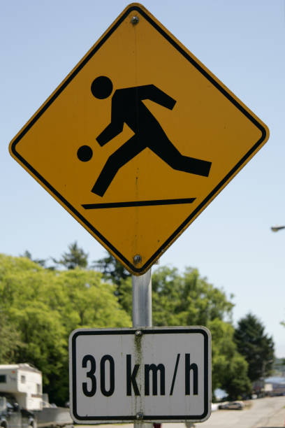 istock Street sign warning children playing at 30kmph 1024208780