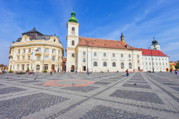 Sibiu is a lovely town in Transylvania area. Cute city center with towers and houses in pastel colors.