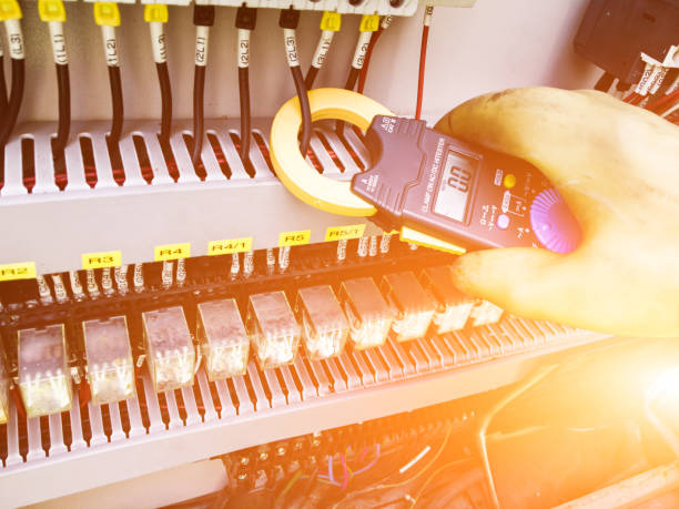 istock Current measurement for maintenance.electrician measurements with multimeter tester. 1024209402