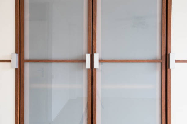 istock wooden white closet doors closeup for clothes modern new design 1024213984