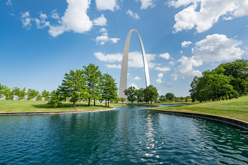 Saint Louis Gateway Arch along the pond in Gateway Arch National Park, Missouri