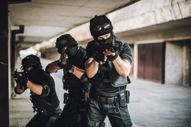 istock Armed police team in action 1024223592