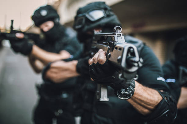 istock Soldier pointing a rifle 1024223962