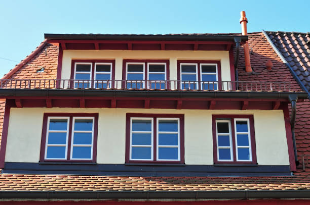 istock mansard windows at building in old town 1024224300