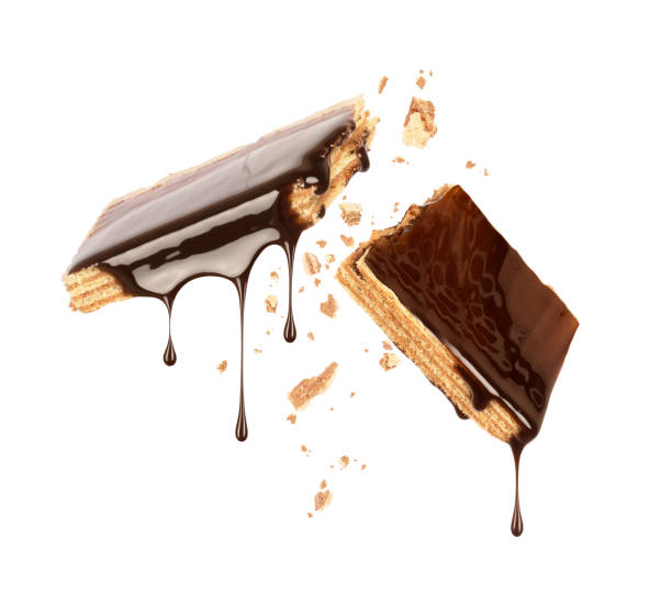 istock Waffles broken into two halves and poured with chocolate 1024226890