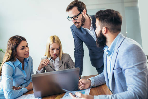 istock Business people working together on project and brainstorming in office 1024227614