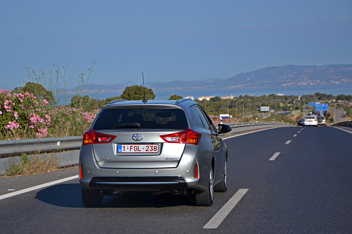 Palma de Mallorca, Spain - 4th July, 2013: Toyota Auris Touring Sports driving on the highway. This family car is one of the most popular vehicles in Toyota offer in Europe.
