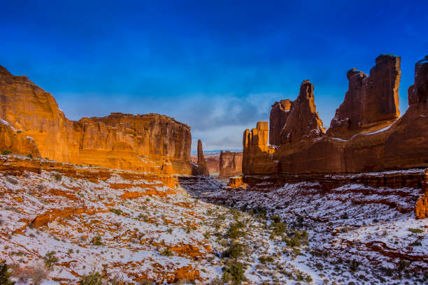istock Park Avenue in Arches National Park during a winter snow 1024234130