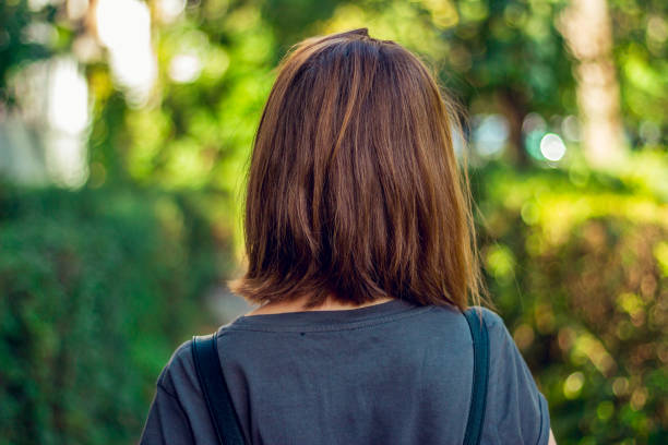 Back view of girl with short haircut stock photo