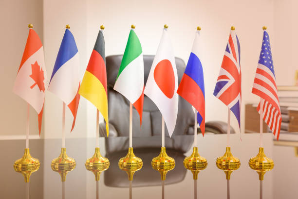World economy, G8 economic policy and political forum concept : National flags of G8 or group of eight major highly industrialized countries i.e Canada, France, Germany, Italy, Japan, Russia, UK, USA economía mundial, la política económica del g8 y concepto de foro político: banderas nacionales de g8 o grupo de los ocho principales países altamente industrializados como canadá, francia, alemania, italia, japón, rusia, reino unido, estados unidos