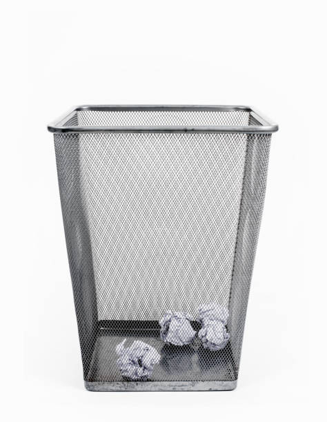 istock Crumpled paper in the bin, on white background. 1024251610