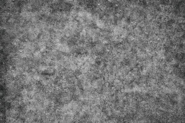 istock The texture is black and white in grunge style. Abstract monochrome background. Pattern of chips, cracks, scuffs, dust, stains 1024253976
